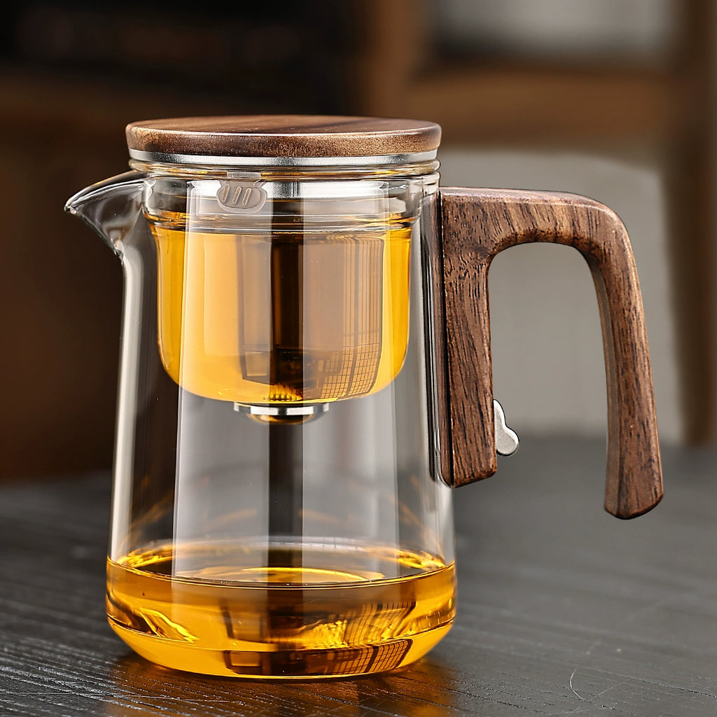 Magnetic absorption tea water separation teapot