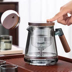 Tea water separation press type heat-resistant glass teapot