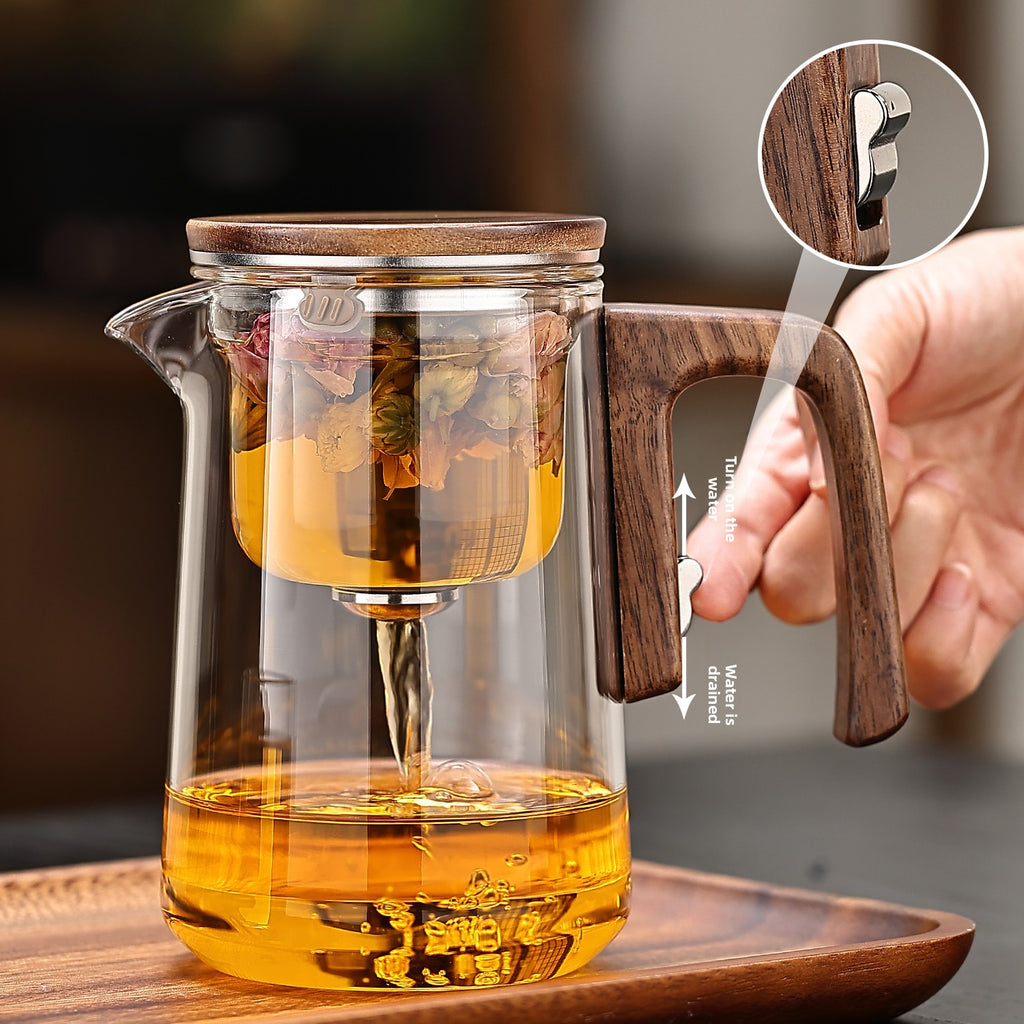 Magnetic absorption tea water separation teapot